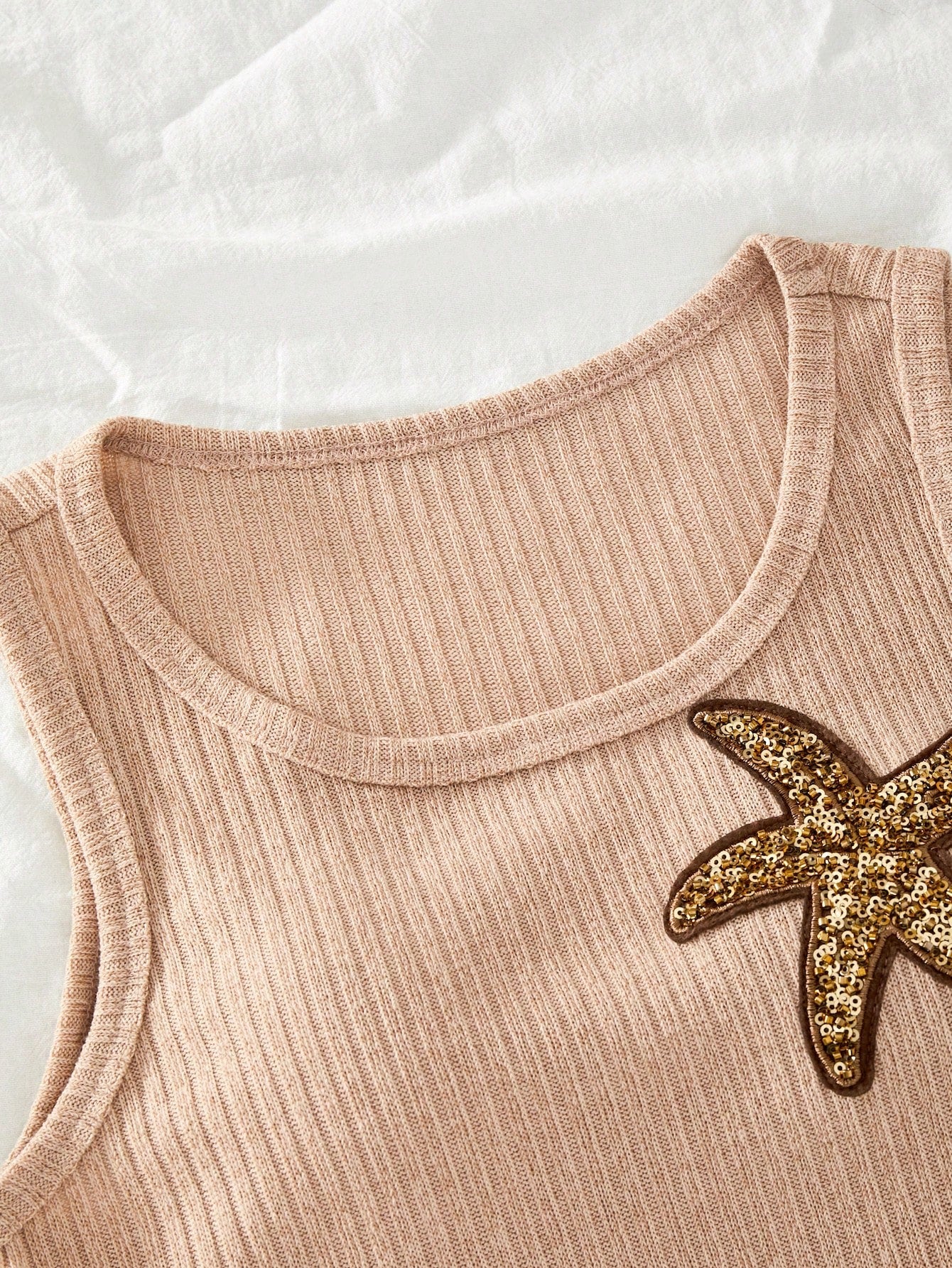Girls' apricot beach knit short dress with sleeveless tank design, tassel detail, star decoration, round neck, and vacation style for summer seaside wear.