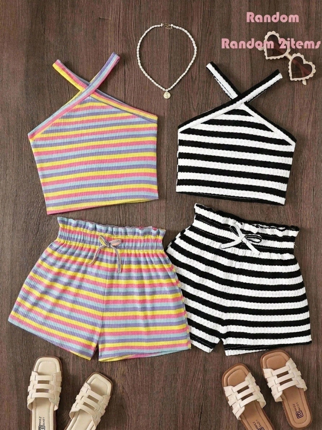 Black and white striped 2-piece set for tween girls featuring a halter sleeveless pullover top with criss-cross knot detail and matching paperbag waist shorts.