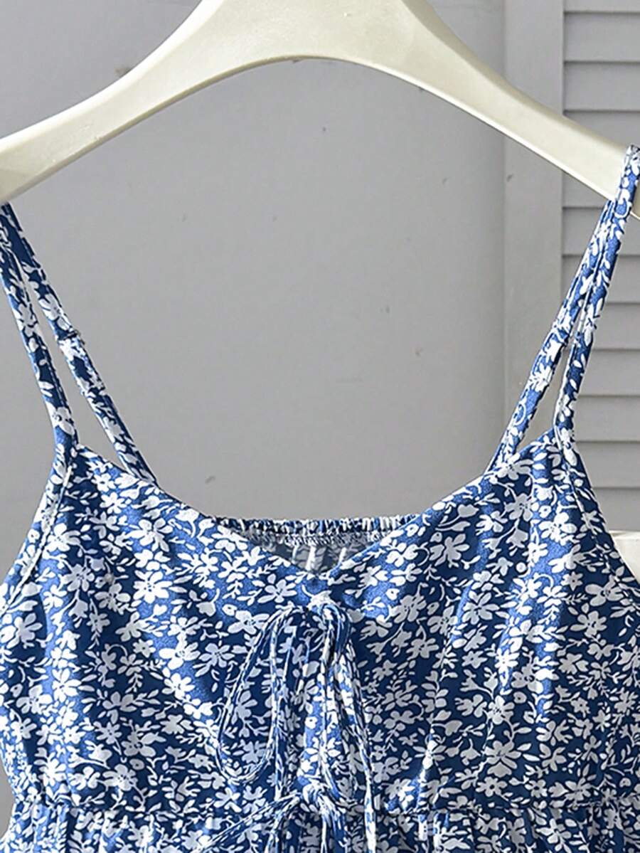Tween girl 2-piece summer set with a black and white sleeveless striped spaghetti strap tank top with ruffle details and matching casual shorts.