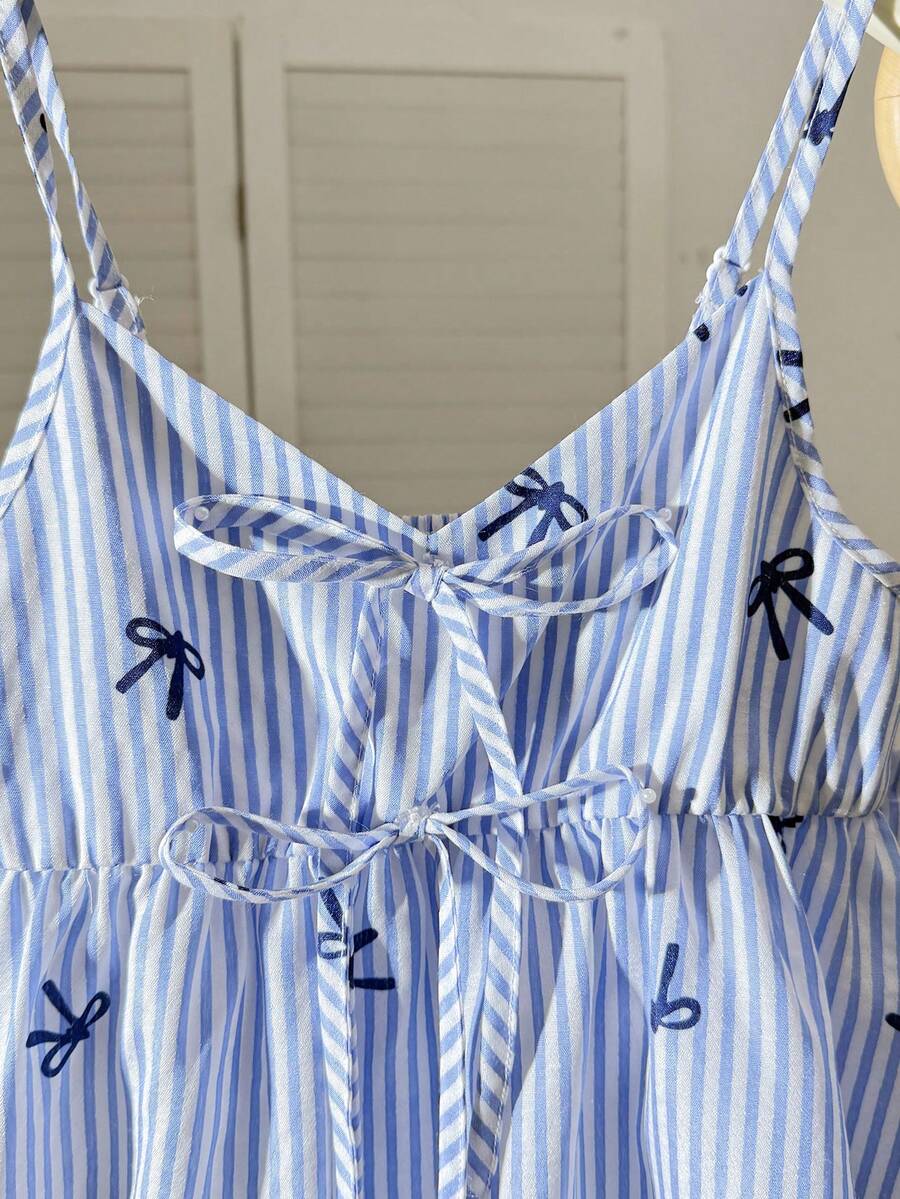 Tween girl 2-piece summer set with a black and white sleeveless striped spaghetti strap tank top with ruffle details and matching casual shorts.