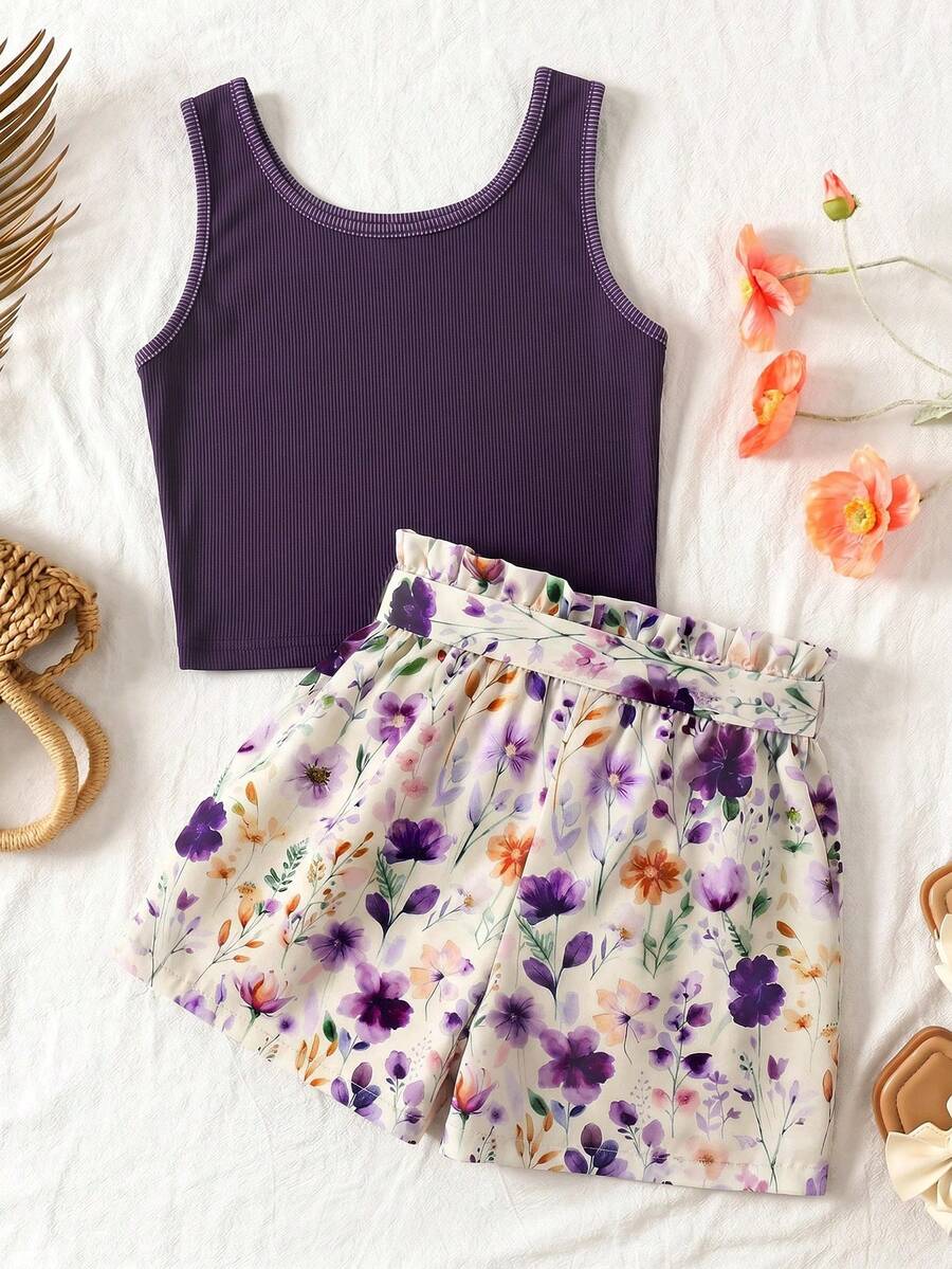 Tween girls 2-piece summer set featuring a turquoise blue ribbed tank top and tropical leaf pattern belted shorts.
