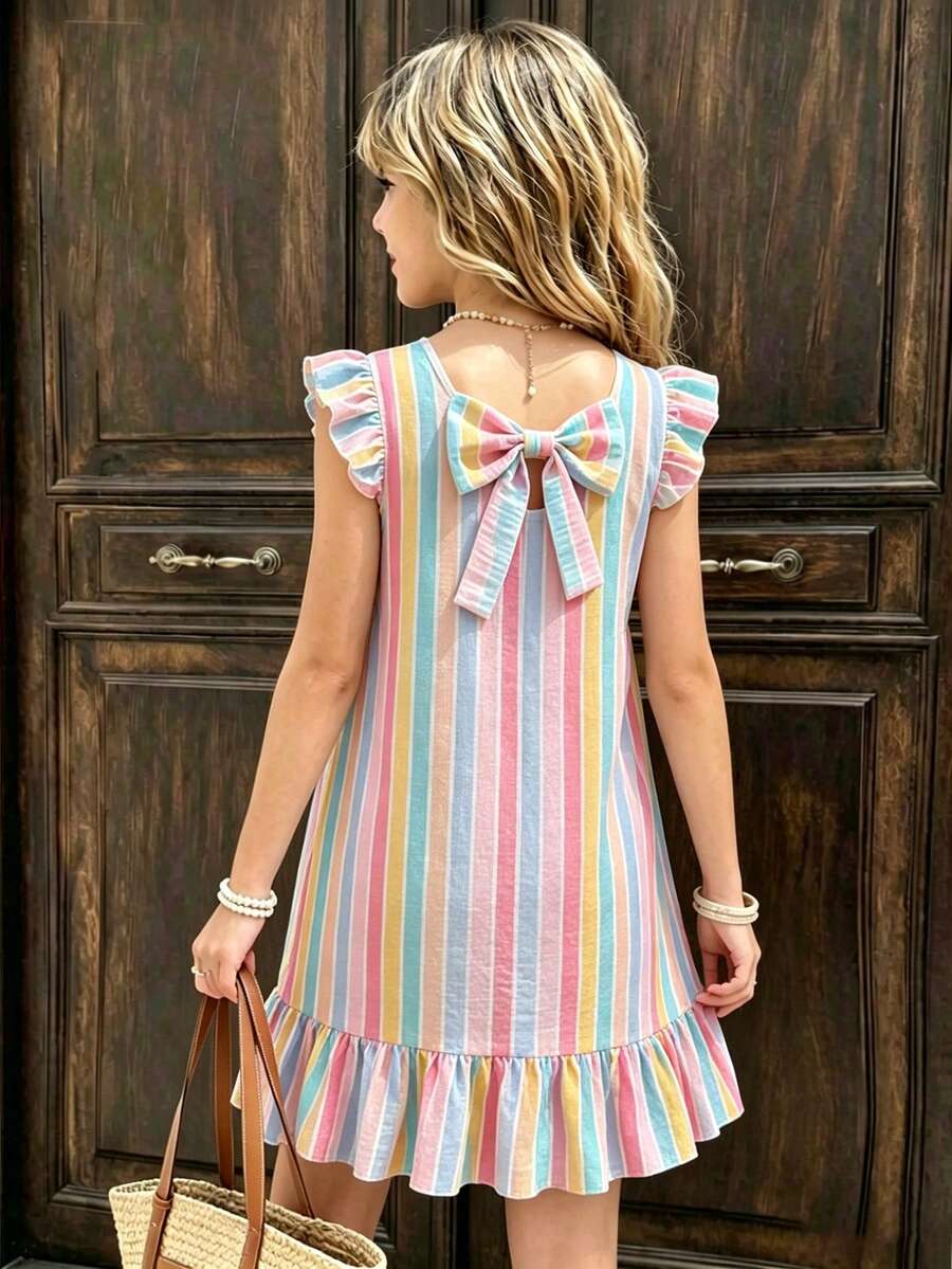 Tween girls apricot vacation midi dress featuring a round neck, cut out details, ruffle flounce accents, and geometric pattern.