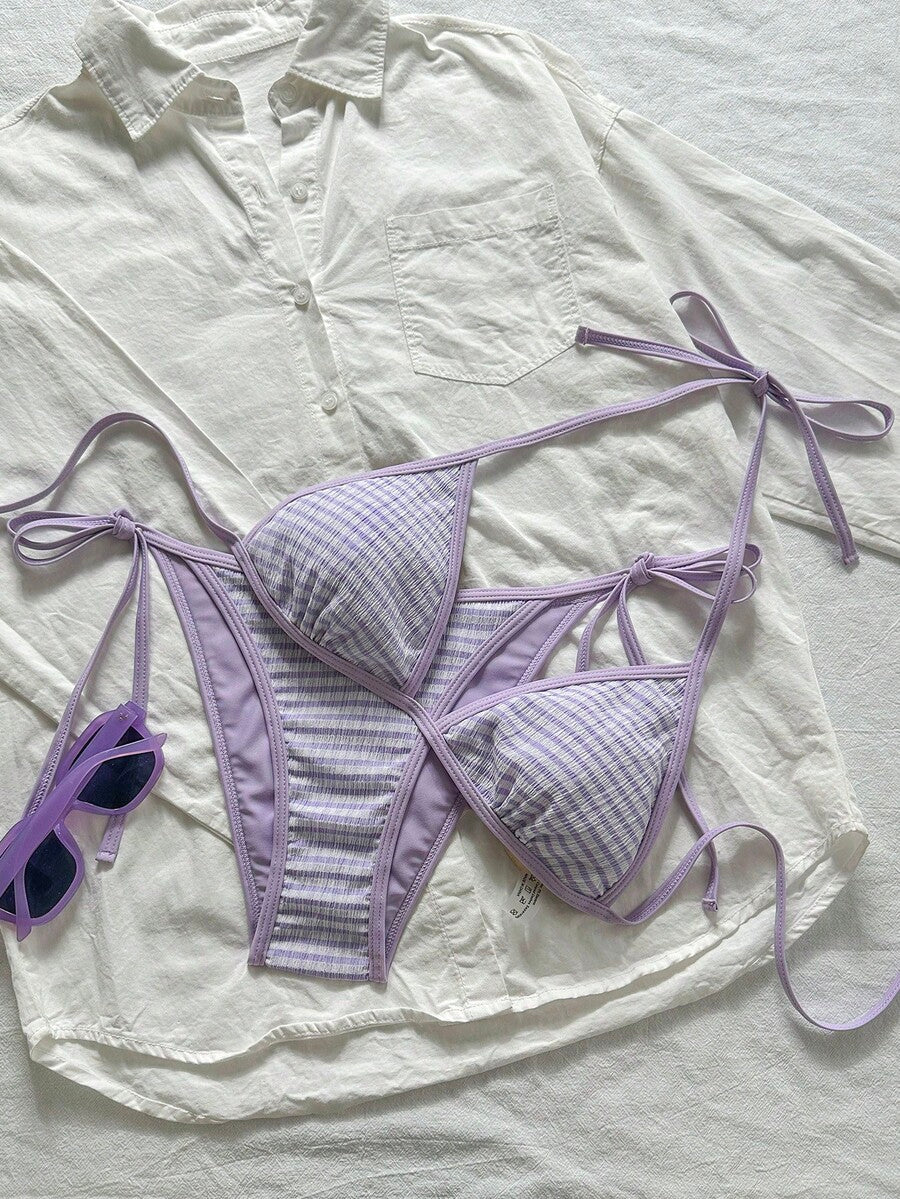 Women's apricot solid halter tie bikini top with triangle cups and matching tie-side swimsuit bottoms.