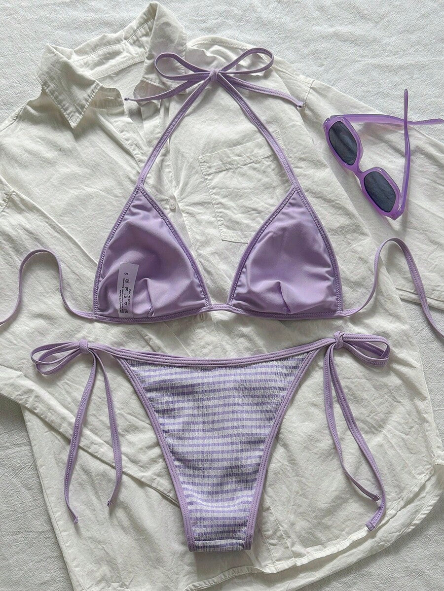 Women's apricot solid halter tie bikini top with triangle cups and matching tie-side swimsuit bottoms.