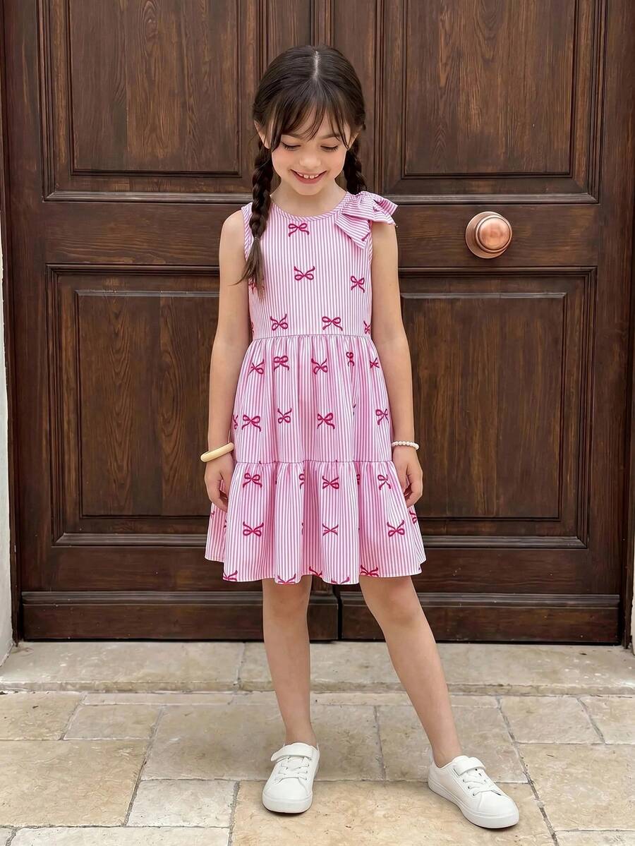 Tween girls blue striped sleeveless smock dress featuring a round neckline, high waist, and flounce ruffle hem.