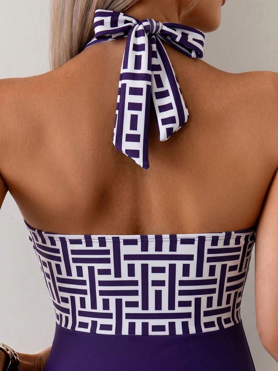 Apricot women's one-piece swimsuit featuring a halter neckline, backless tie-back detail, and ruched knitted fabric.