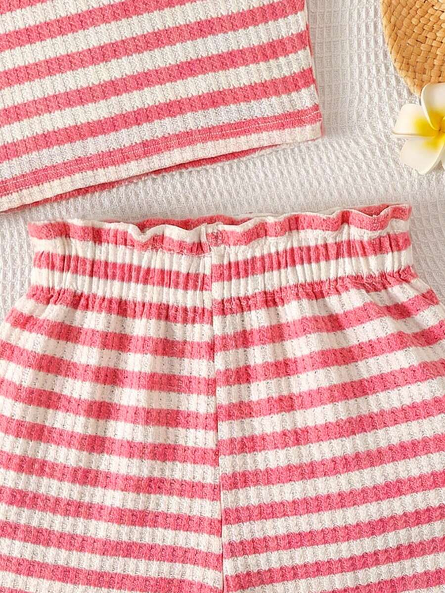 Tween girl 2-piece casual outfit set featuring a solid beige knit halter sleeveless top with belted detail and matching shorts.