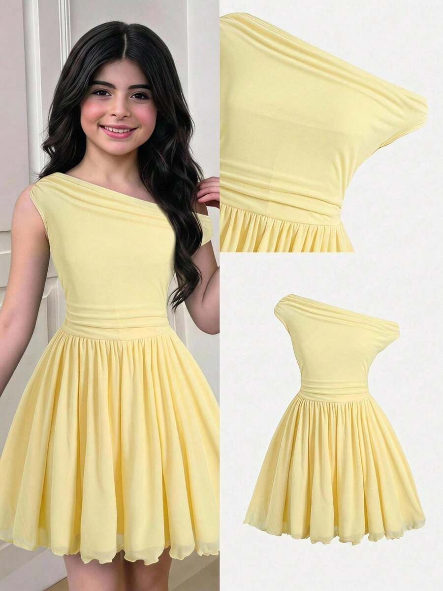 Tween girl wearing an apricot asymmetrical tiered sleeveless party dress with an A-line silhouette.