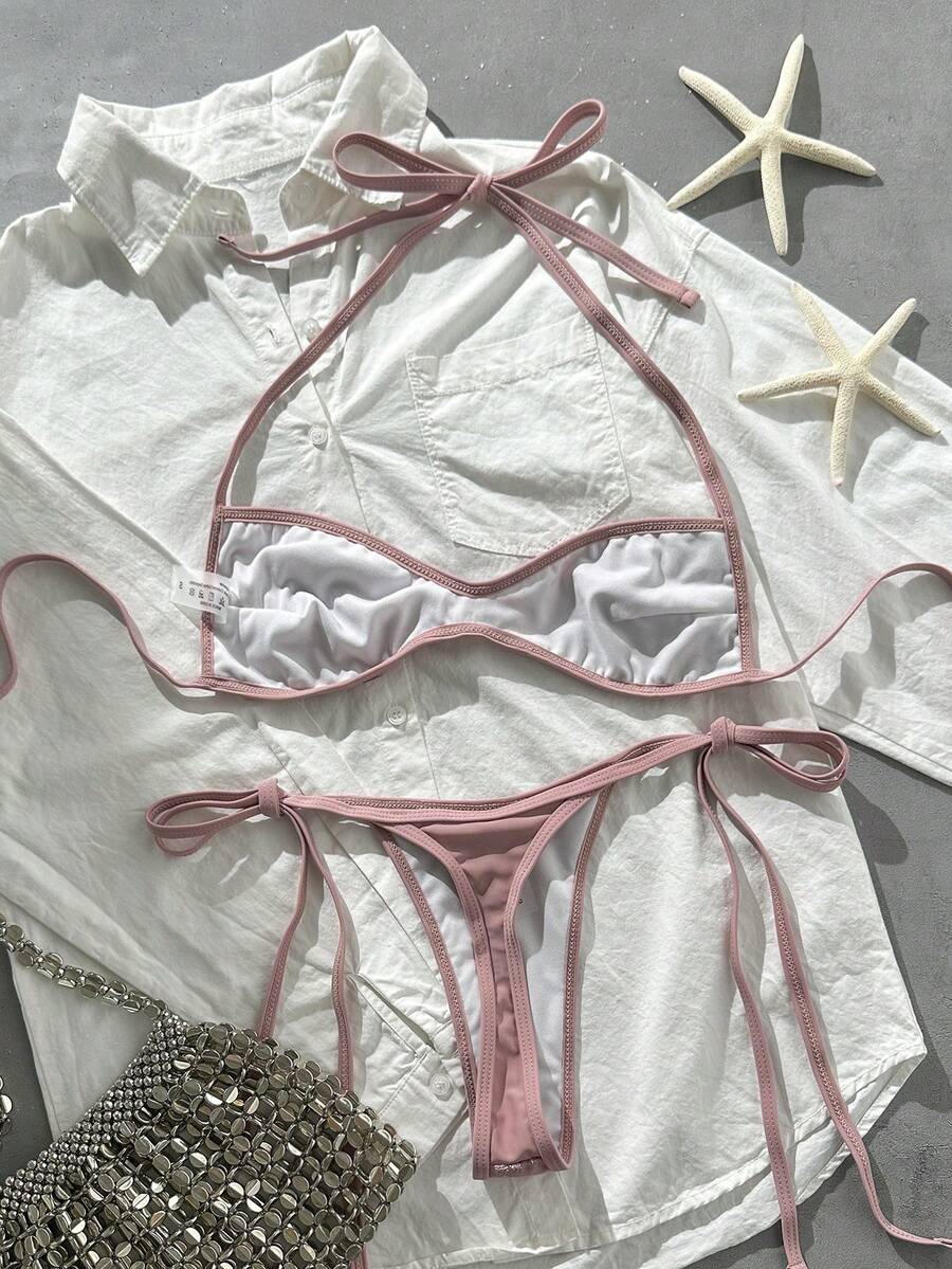 Apricot 2-piece sequin textured halter bikini set featuring a wireless top with lace-up backless ties and matching low-waist side-tie thong bottoms.