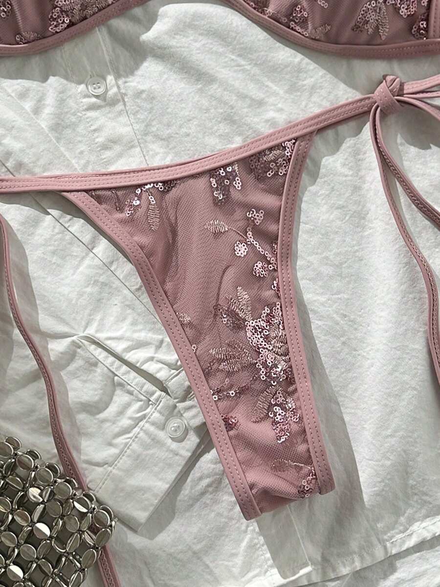 Apricot 2-piece sequin textured halter bikini set featuring a wireless top with lace-up backless ties and matching low-waist side-tie thong bottoms.