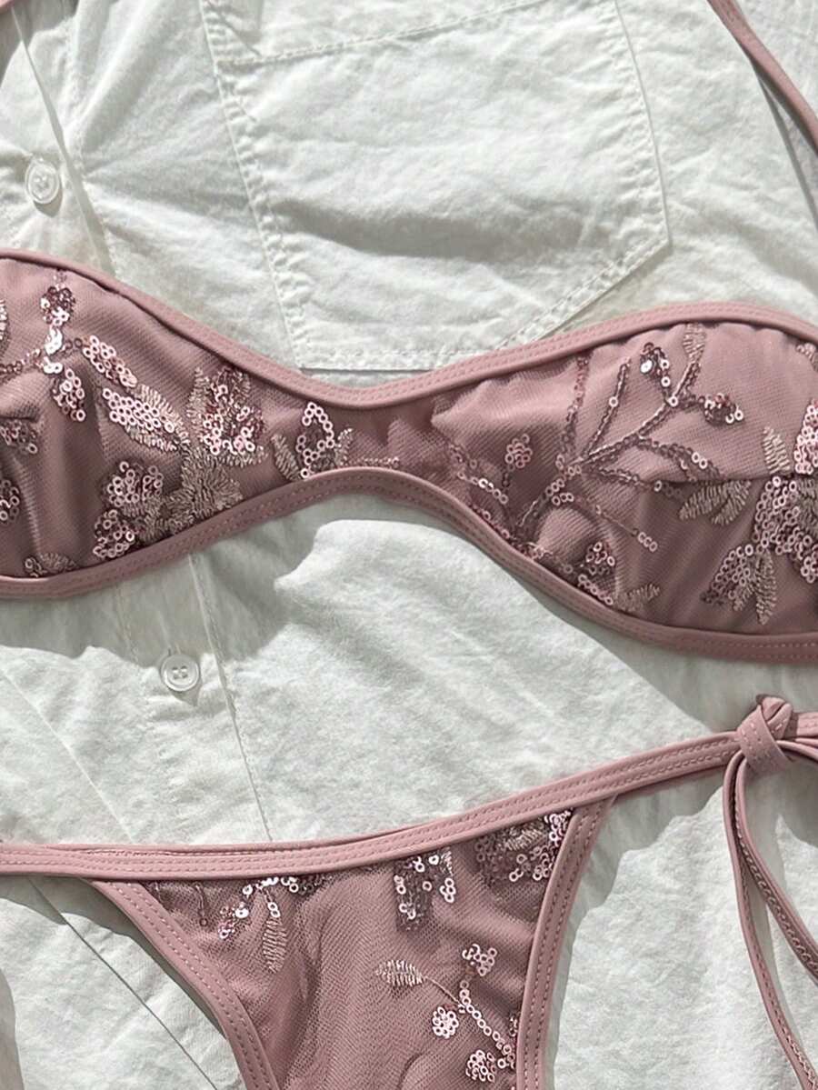 Apricot 2-piece sequin textured halter bikini set featuring a wireless top with lace-up backless ties and matching low-waist side-tie thong bottoms.
