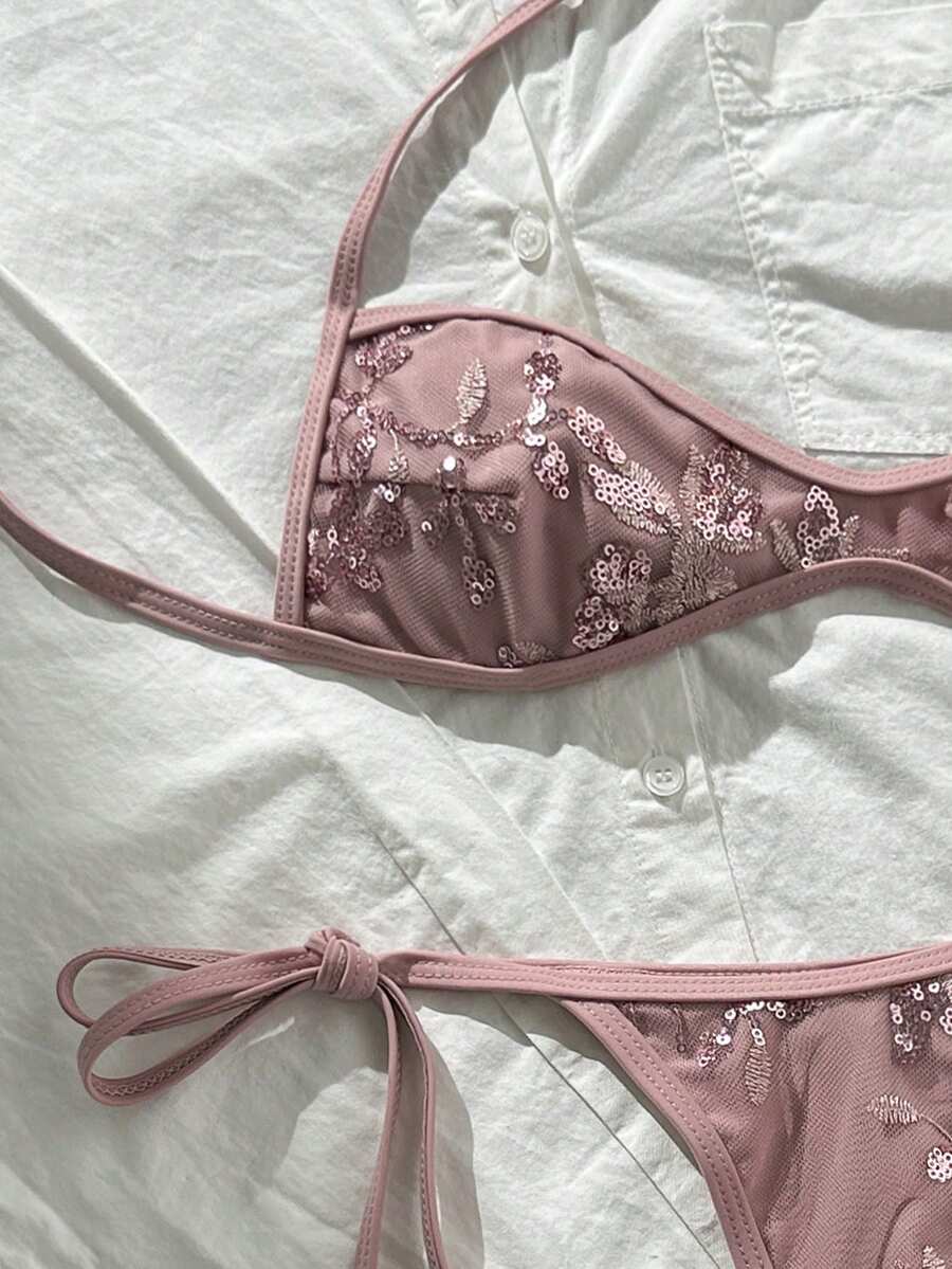 Apricot 2-piece sequin textured halter bikini set featuring a wireless top with lace-up backless ties and matching low-waist side-tie thong bottoms.