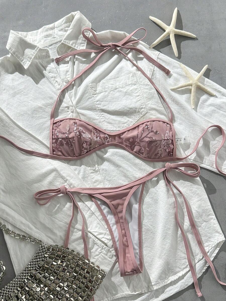 Apricot 2-piece sequin textured halter bikini set featuring a wireless top with lace-up backless ties and matching low-waist side-tie thong bottoms.