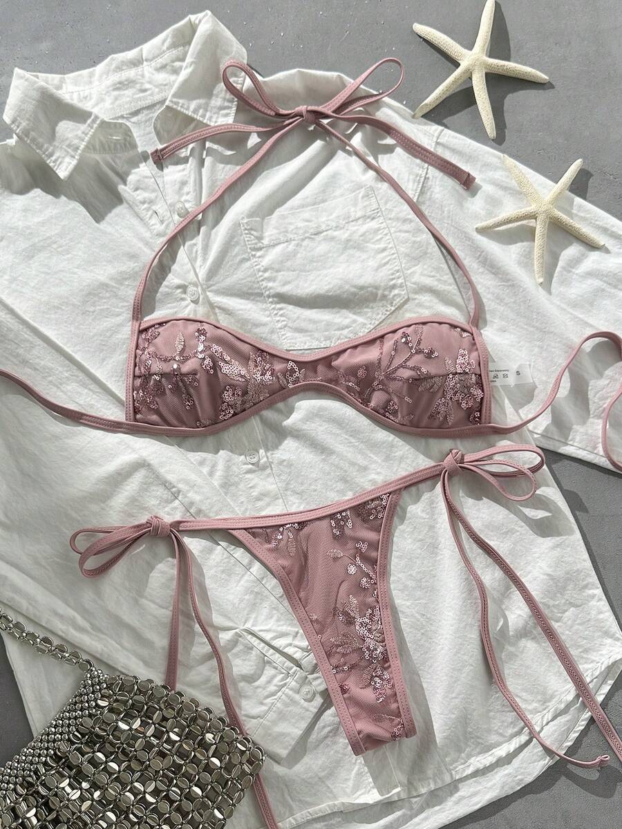 Apricot 2-piece sequin textured halter bikini set featuring a wireless top with lace-up backless ties and matching low-waist side-tie thong bottoms.