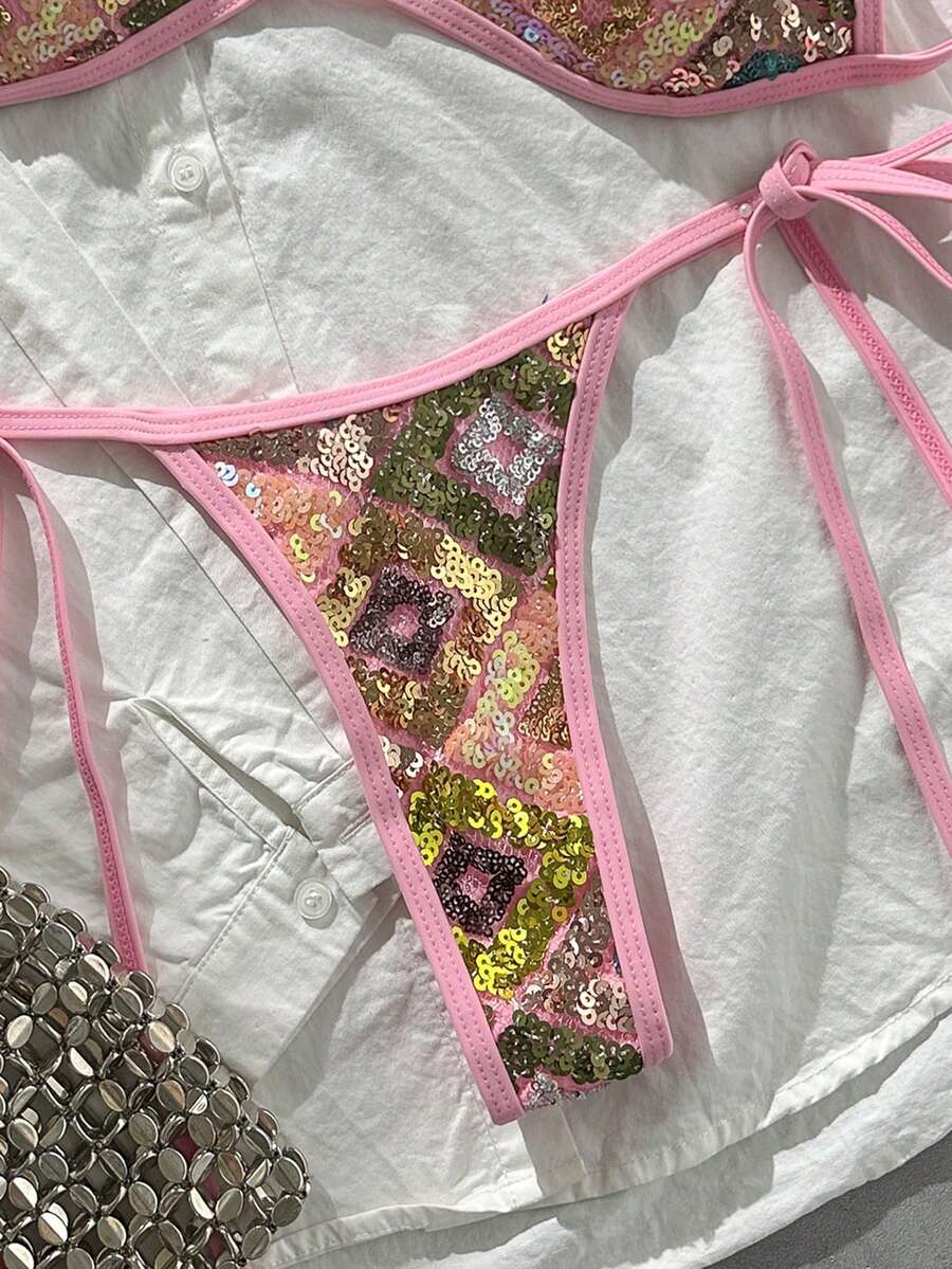 Apricot 2-piece sequin textured halter bikini set featuring a wireless top with lace-up backless ties and matching low-waist side-tie thong bottoms.