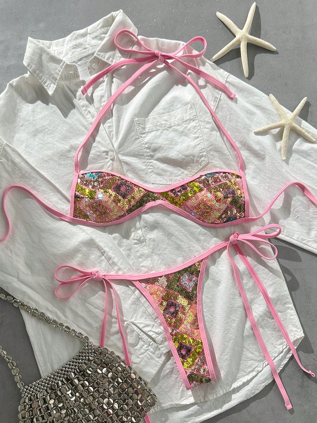 Apricot 2-piece sequin textured halter bikini set featuring a wireless top with lace-up backless ties and matching low-waist side-tie thong bottoms.