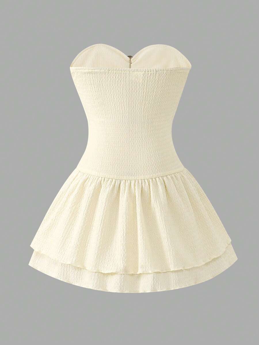 Tween girls apricot sleeveless halter mini dress with textured starfish and shell decor, shirred tiered layer, high waist, and flounce hem.