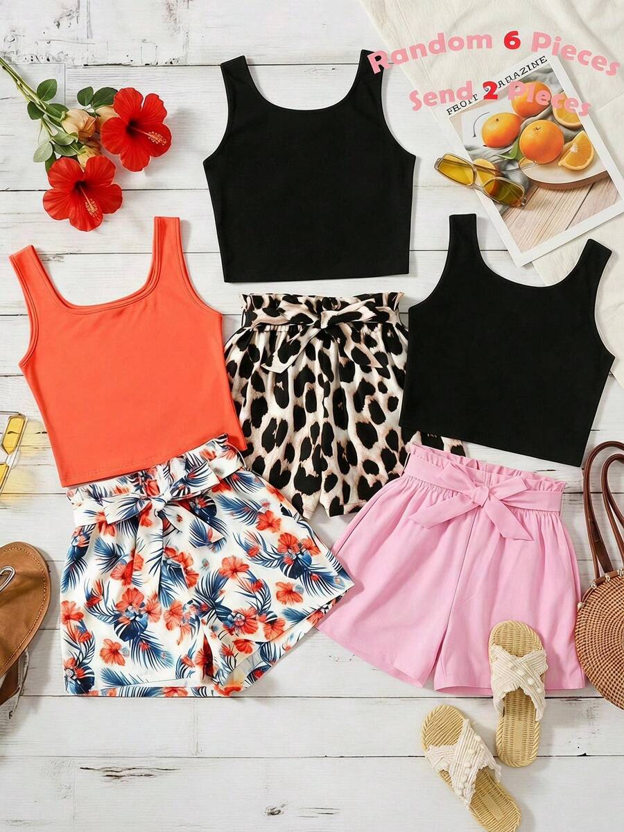 Tween girl wearing a casual 2-piece set featuring a black rib-knit scoop neck tank top and leopard print paperbag waist shorts with a matching belt.