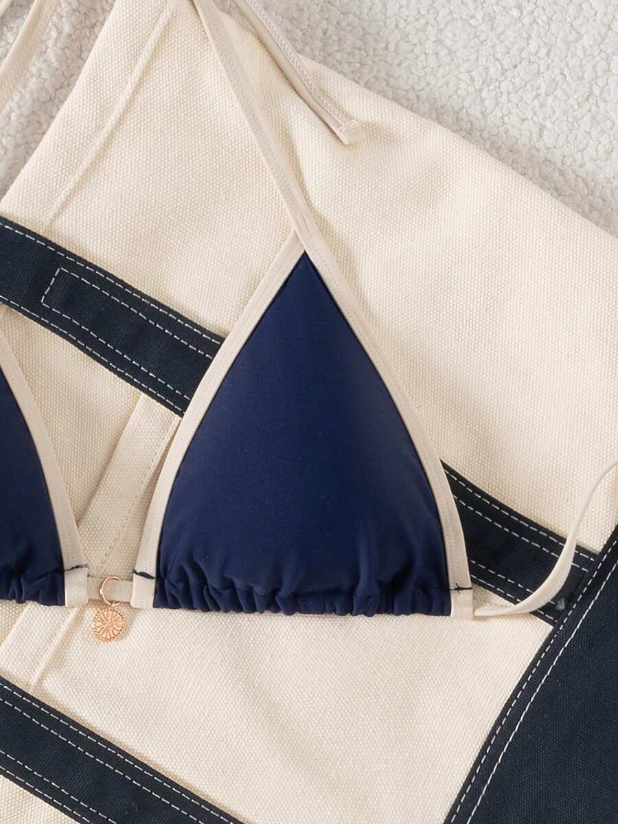 Women's high waist 2-piece triangle bikini set featuring colorblock trim, halter neckline, wireless bra with removable padding, and tie-side bottoms.