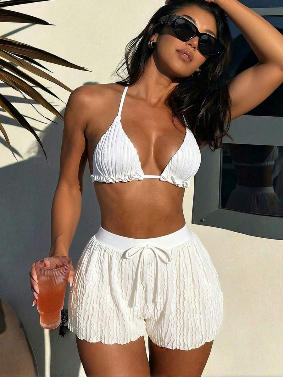 Women's 3-piece frill trim bikini set with halter tie-back top and high waist bottoms.