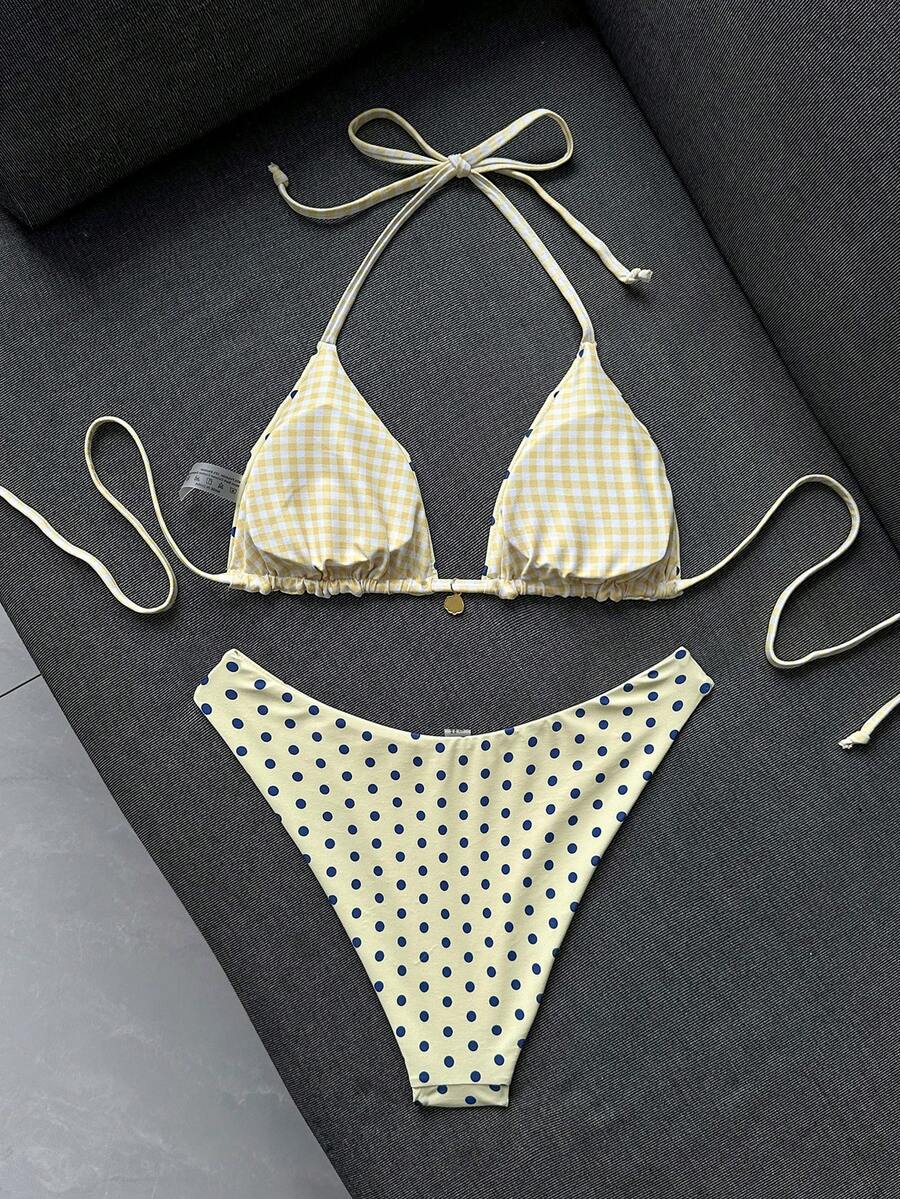 Women's black textured plaid 2-piece bikini set featuring a halter neckline, wireless triangle cups with removable padding, and mid-waist bottoms.