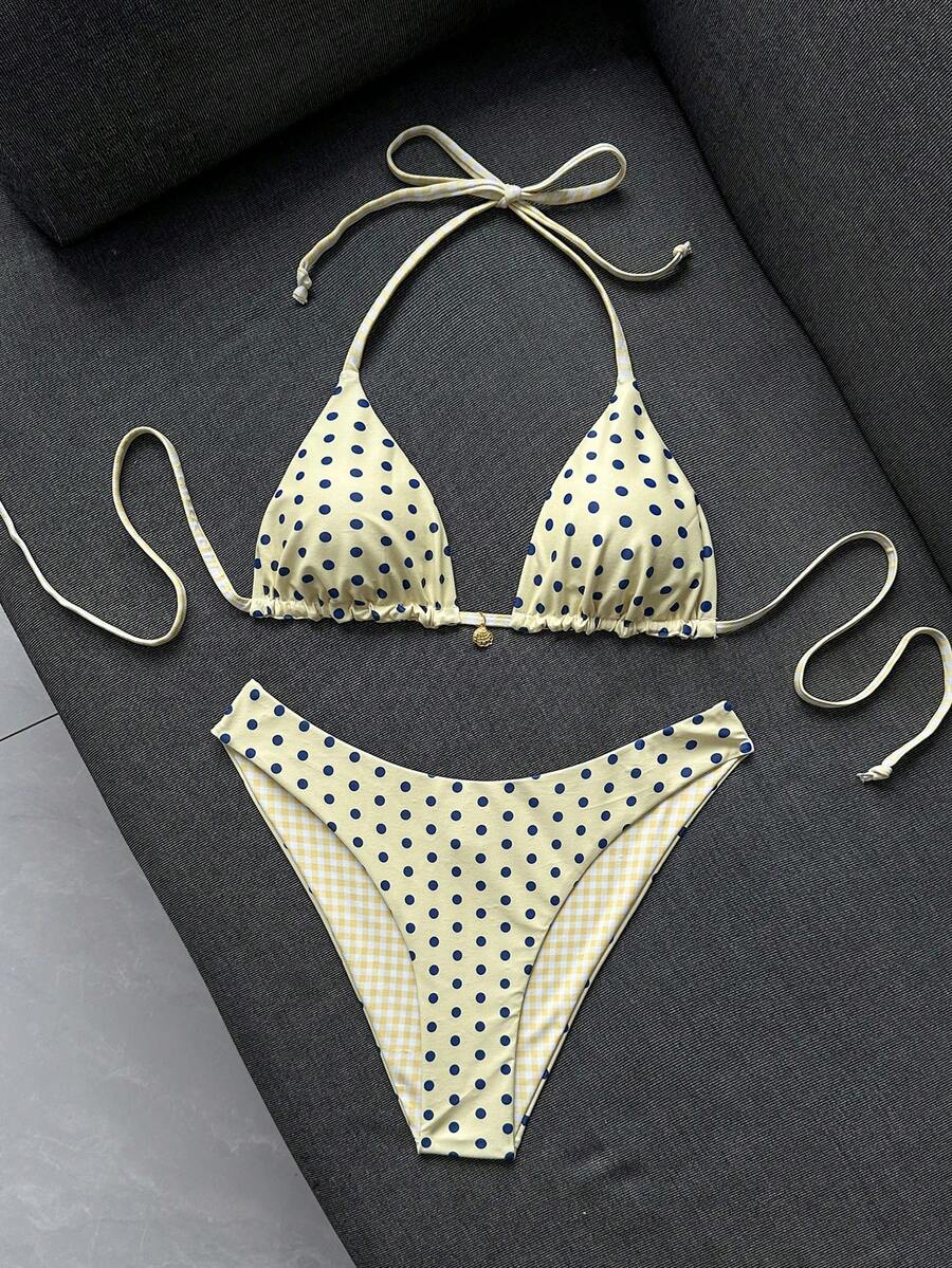 Women's black textured plaid 2-piece bikini set featuring a halter neckline, wireless triangle cups with removable padding, and mid-waist bottoms.