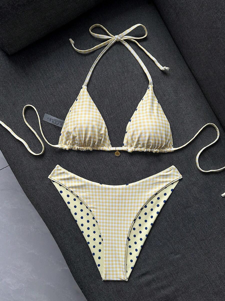 Women's black textured plaid 2-piece bikini set featuring a halter neckline, wireless triangle cups with removable padding, and mid-waist bottoms.