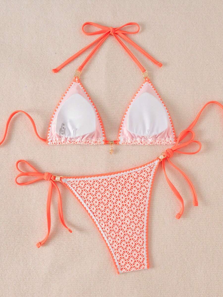 Women's triangle bikini set with contrast lace wireless bra top and ultra high waist tie side bottoms.