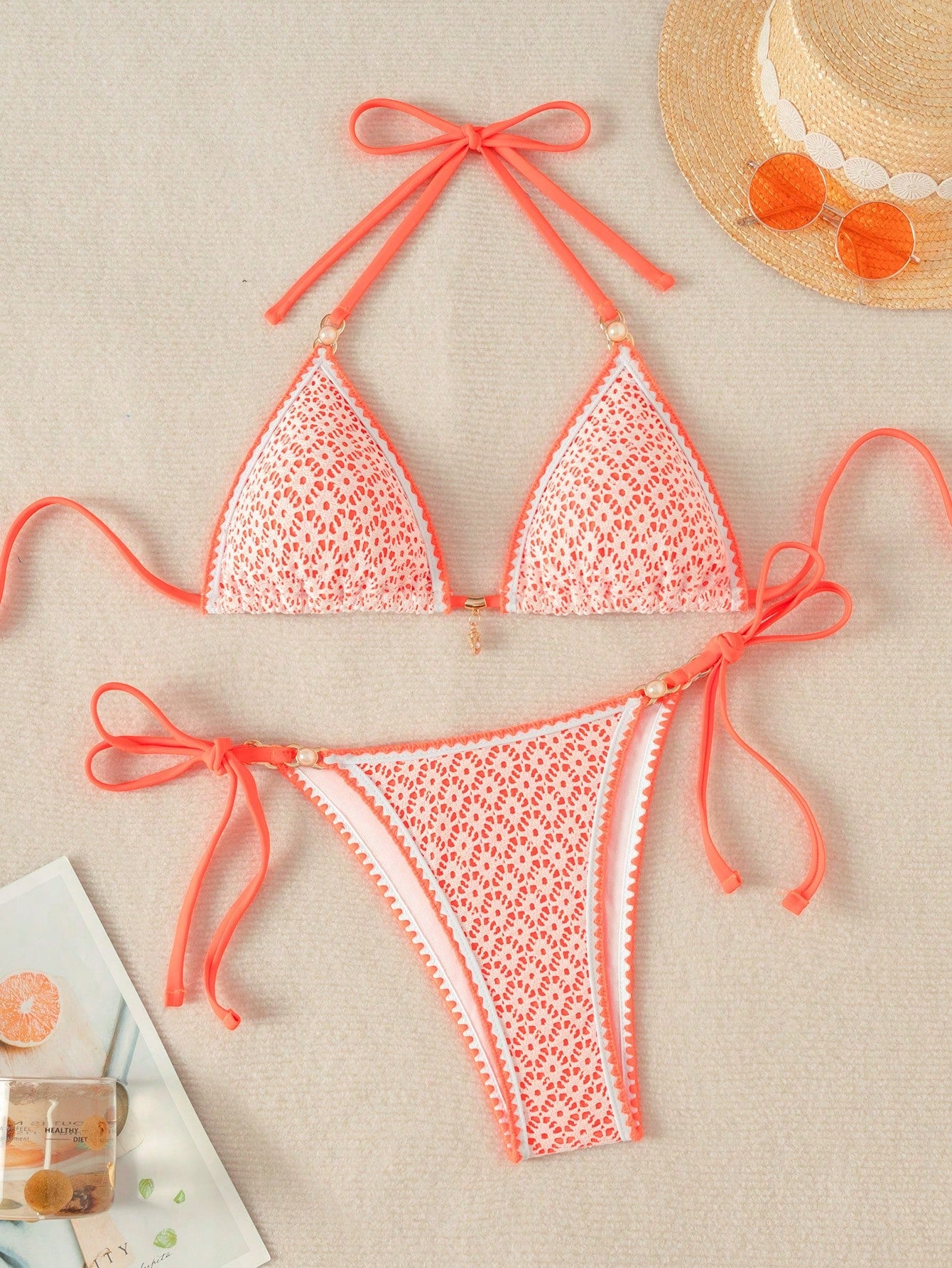 Women's triangle bikini set with contrast lace wireless bra top and ultra high waist tie side bottoms.