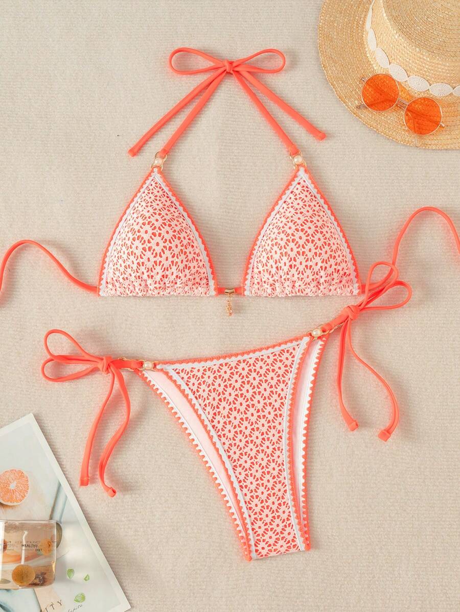 Women's triangle bikini set with contrast lace wireless bra top and ultra high waist tie side bottoms.
