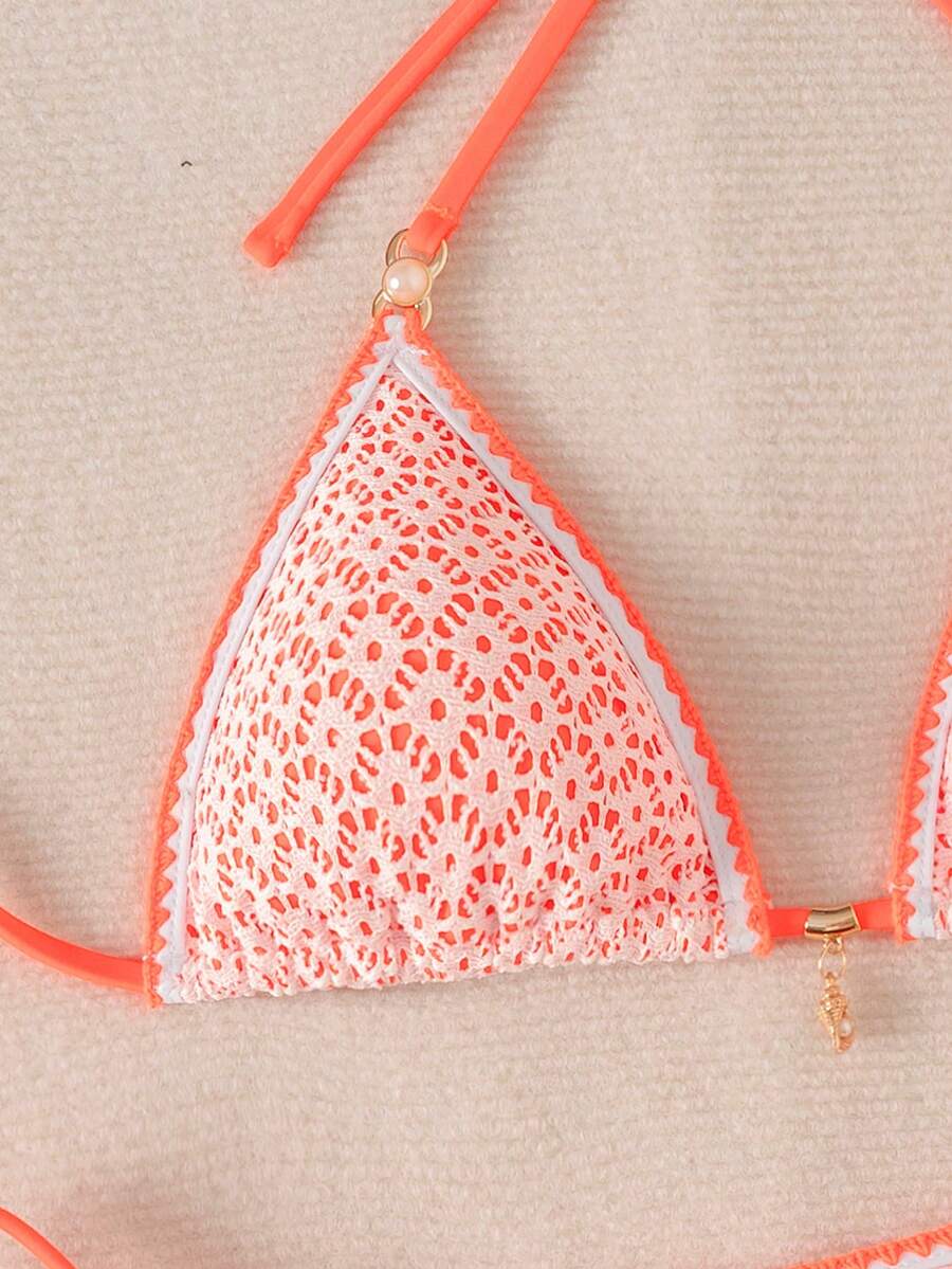 Women's triangle bikini set with contrast lace wireless bra top and ultra high waist tie side bottoms.