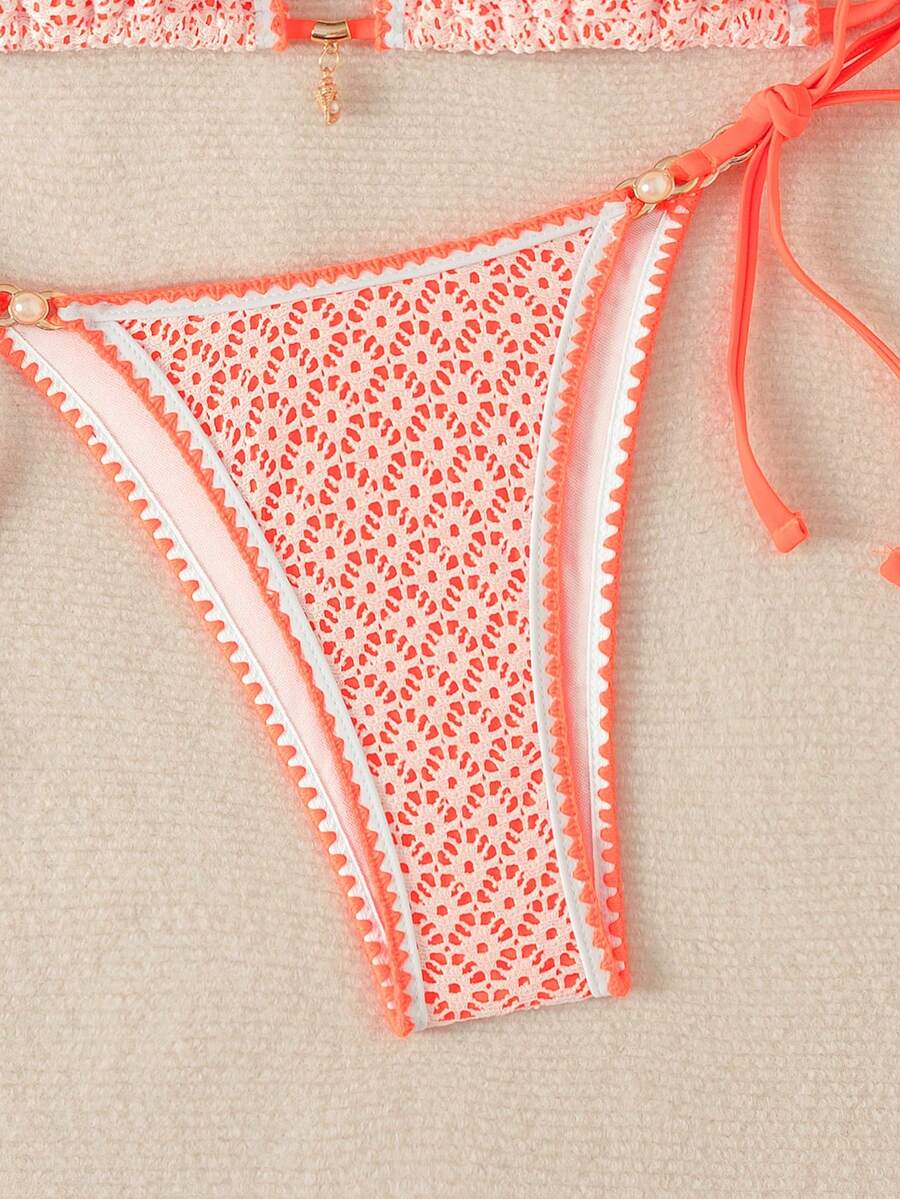 Women's triangle bikini set with contrast lace wireless bra top and ultra high waist tie side bottoms.