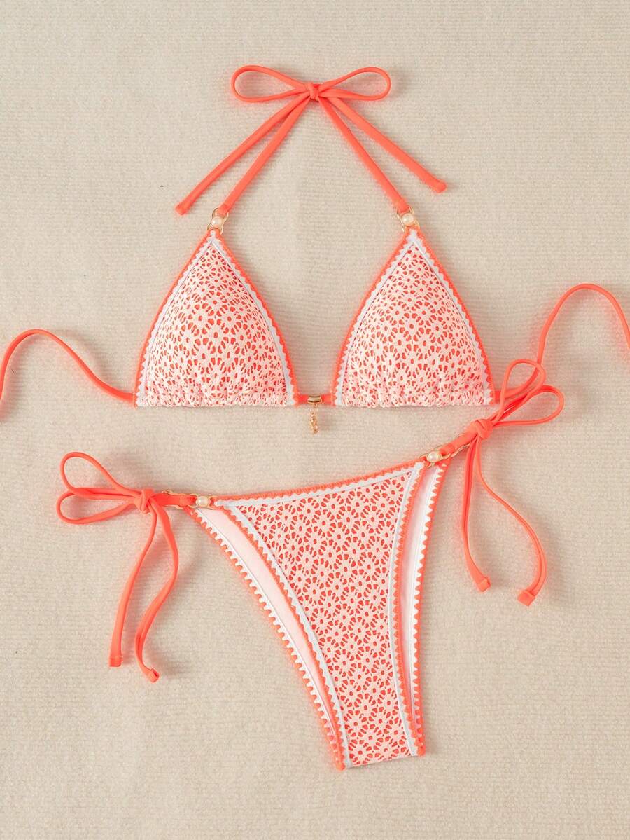 Women's triangle bikini set with contrast lace wireless bra top and ultra high waist tie side bottoms.