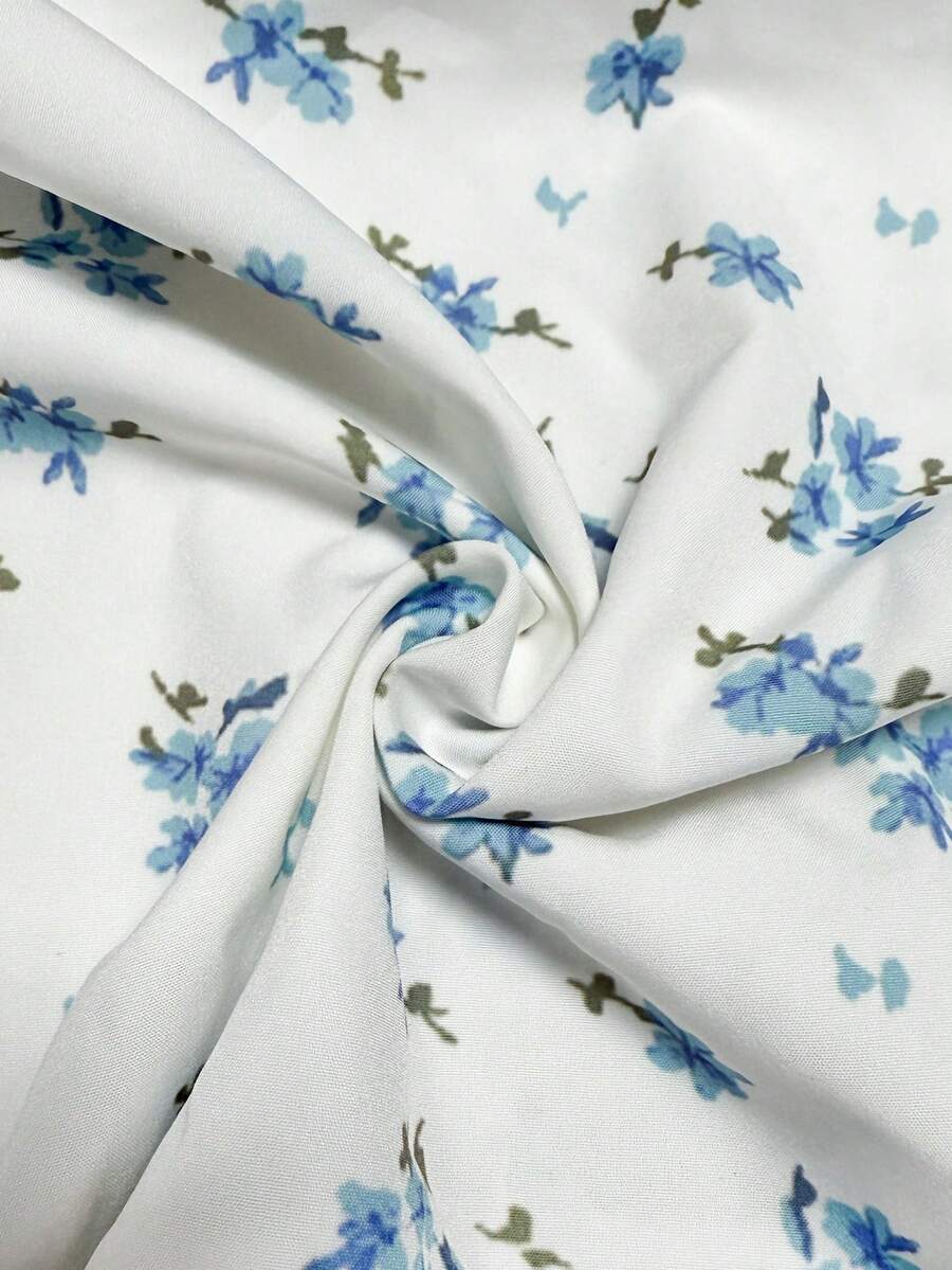 Tween girl blue plant print spaghetti strap cami dress with shirred high waist and flounce ruffled hem