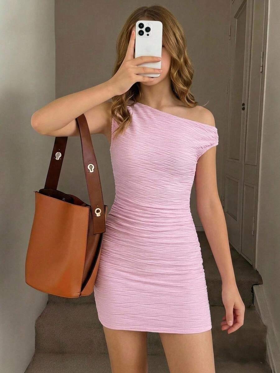 Yellow asymmetrical neck slim fit dress for tween girls with sleeveless design, plain textured knit fabric, natural waist, and pencil hem