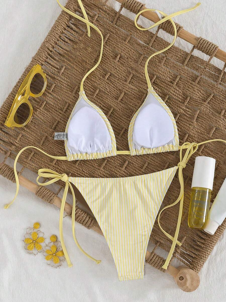 Women's high waist 2-piece triangle bikini set featuring colorblock trim, halter neckline, wireless bra with removable padding, and tie-side bottoms.