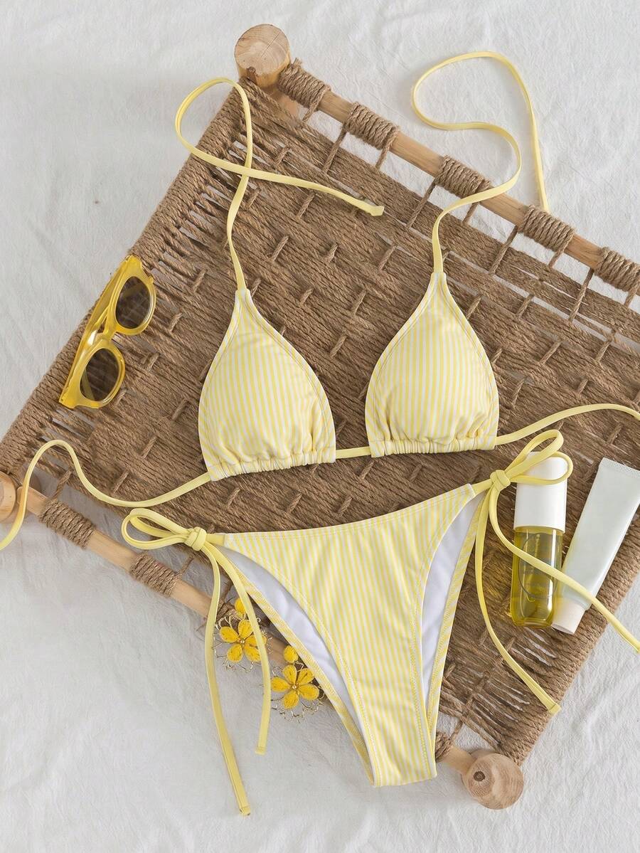 Women's high waist 2-piece triangle bikini set featuring colorblock trim, halter neckline, wireless bra with removable padding, and tie-side bottoms.