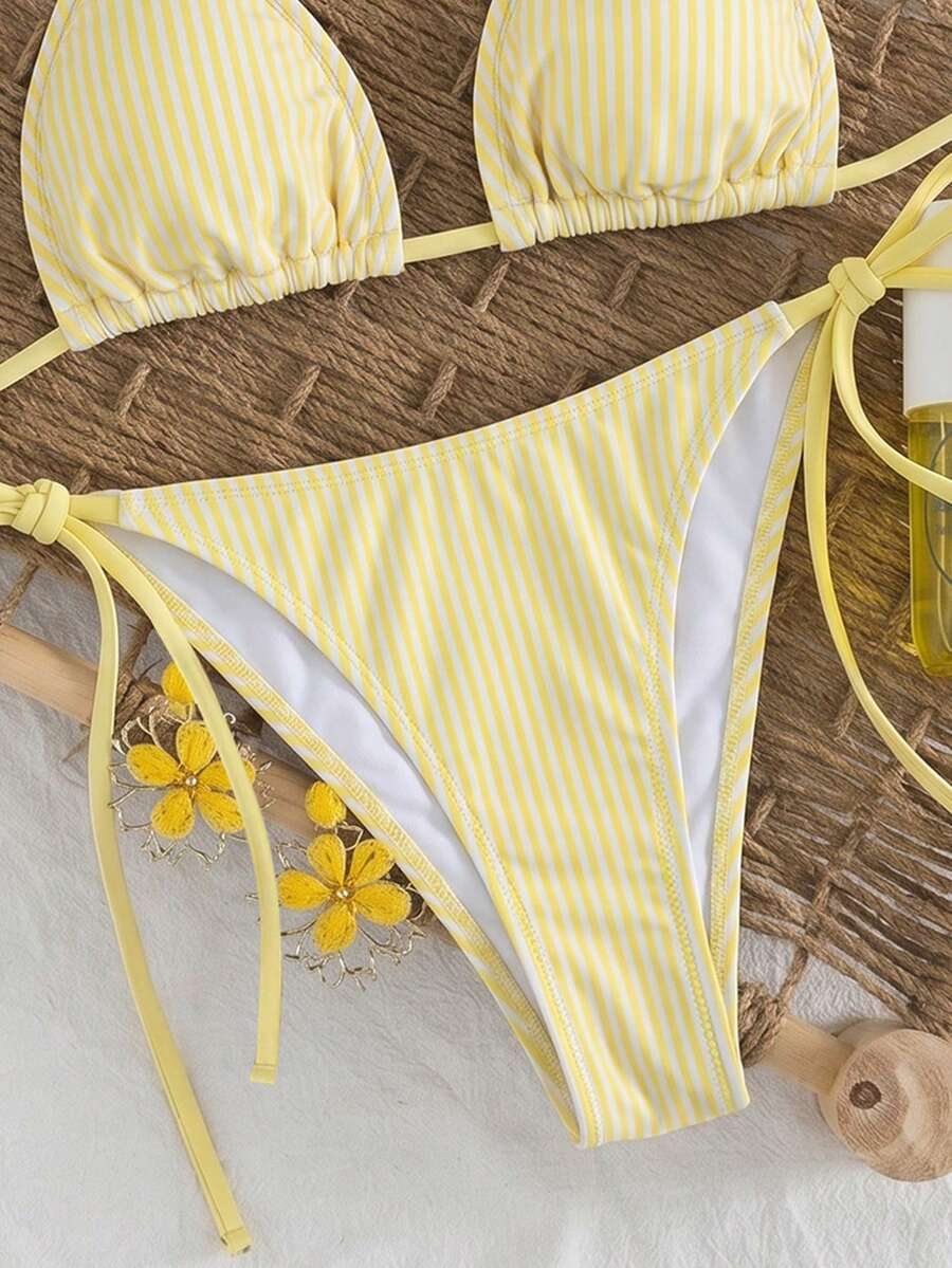 Women's high waist 2-piece triangle bikini set featuring colorblock trim, halter neckline, wireless bra with removable padding, and tie-side bottoms.