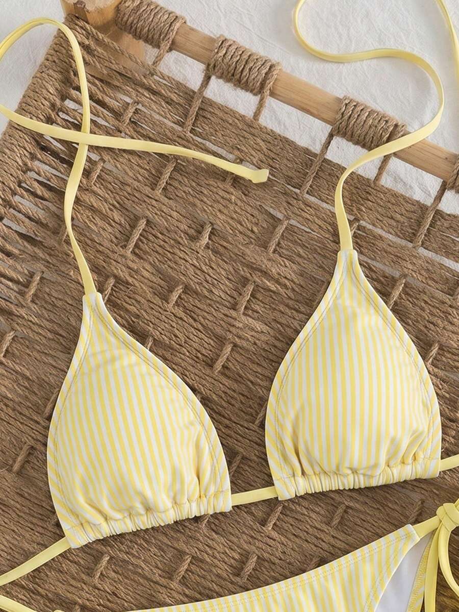 Women's high waist 2-piece triangle bikini set featuring colorblock trim, halter neckline, wireless bra with removable padding, and tie-side bottoms.