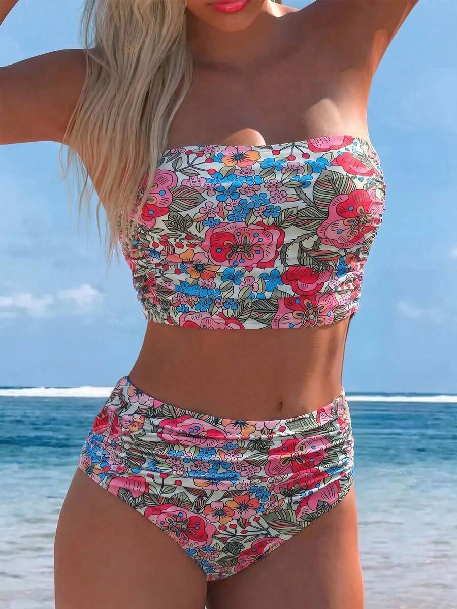 Women's black strapless ruched bandeau bikini top with high waisted bottoms