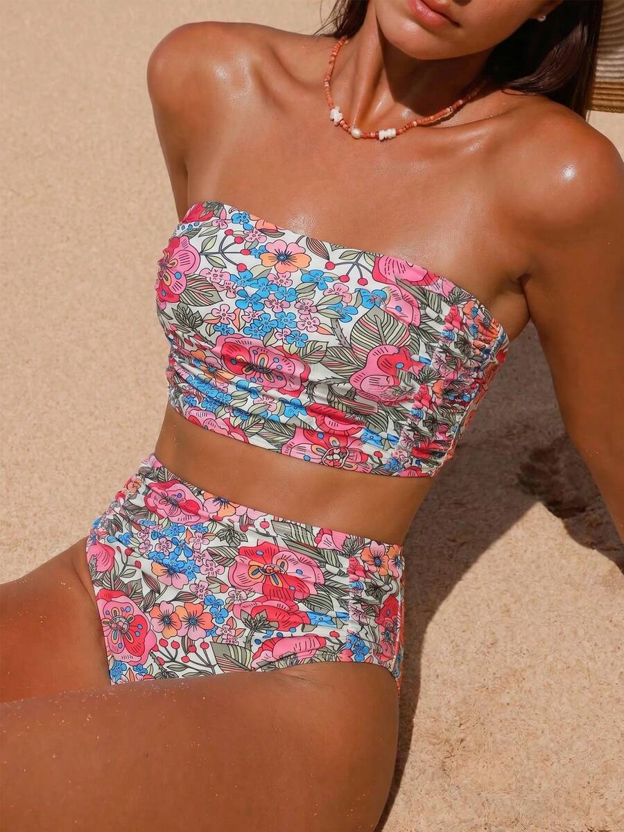 Women's black strapless ruched bandeau bikini top with high waisted bottoms