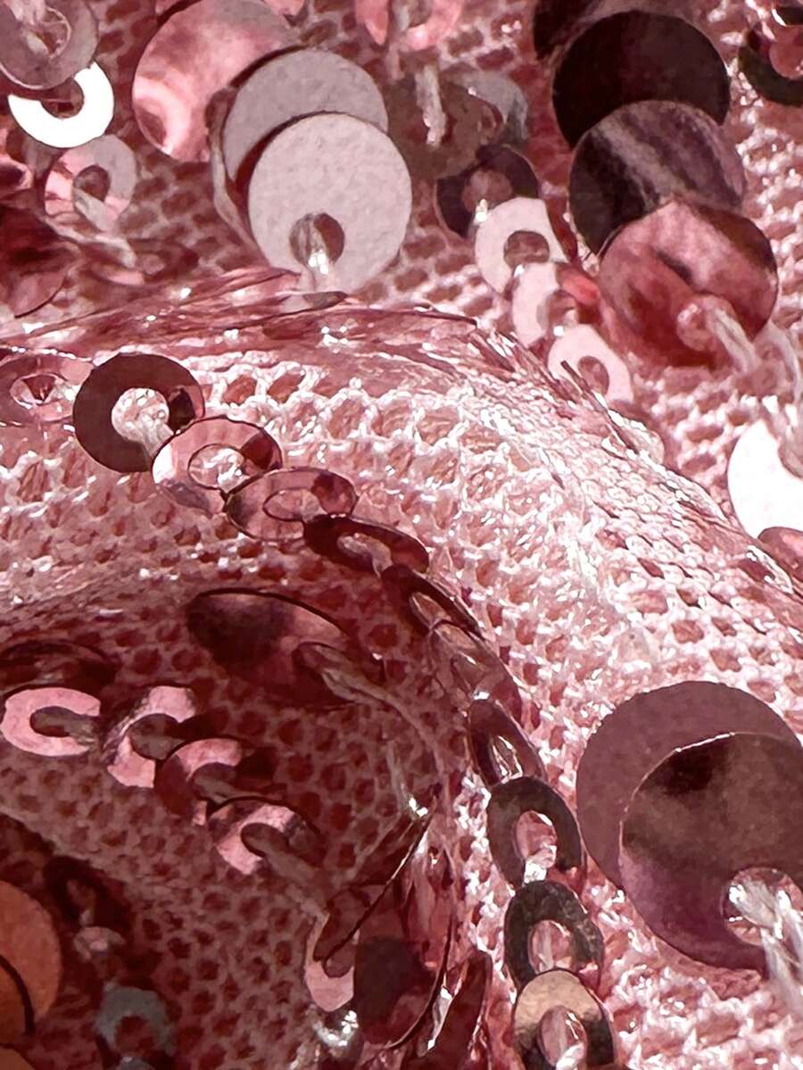 Apricot 2-piece sequin textured halter bikini set featuring a wireless top with lace-up backless ties and matching low-waist side-tie thong bottoms.