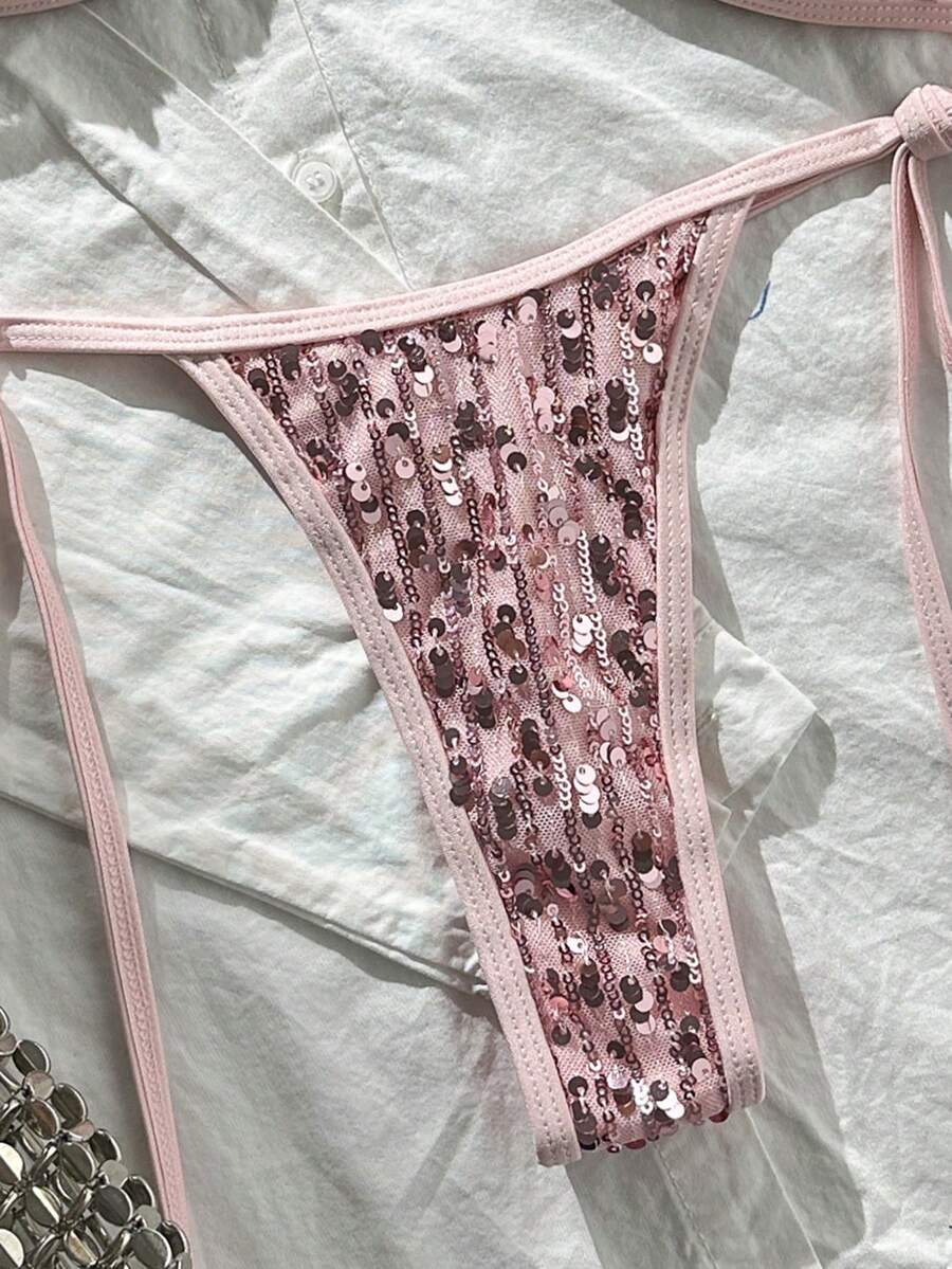 Apricot 2-piece sequin textured halter bikini set featuring a wireless top with lace-up backless ties and matching low-waist side-tie thong bottoms.