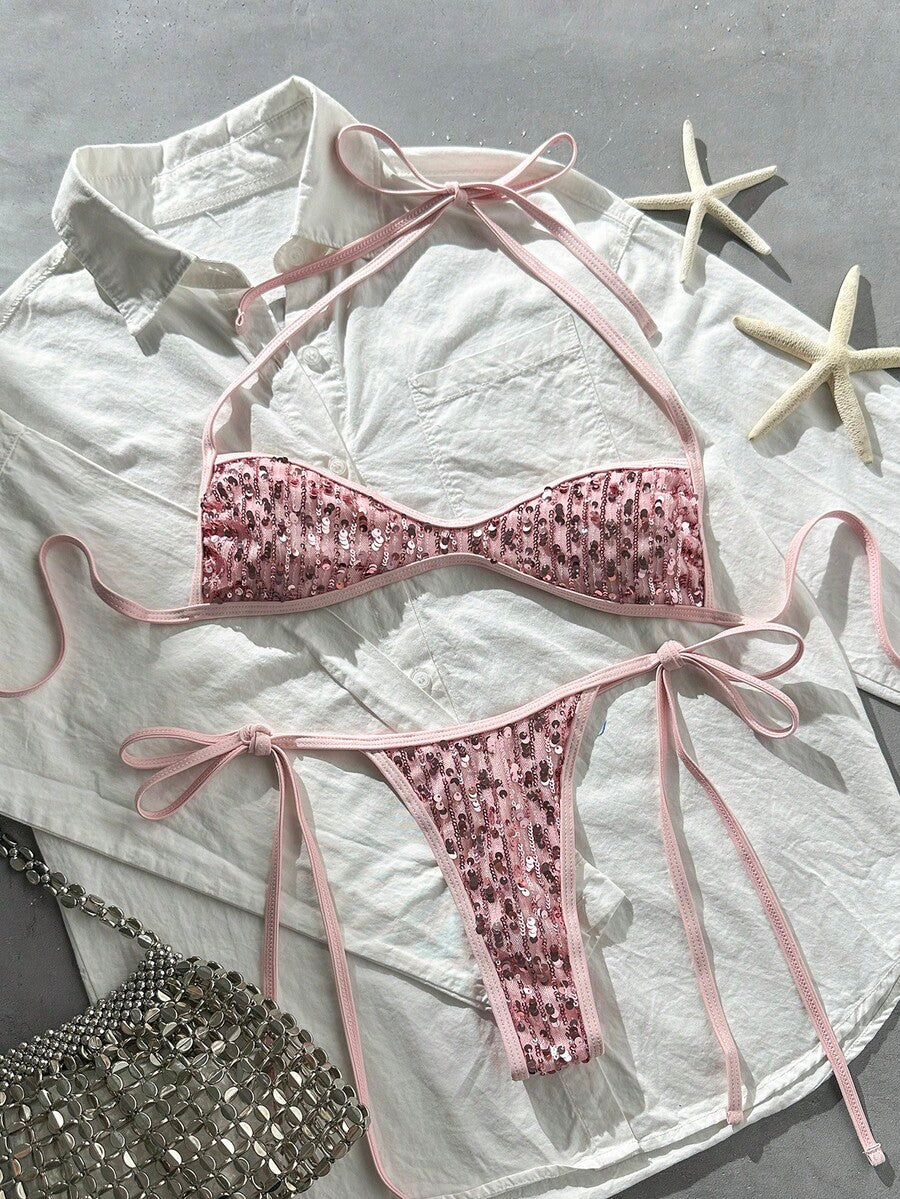Apricot 2-piece sequin textured halter bikini set featuring a wireless top with lace-up backless ties and matching low-waist side-tie thong bottoms.