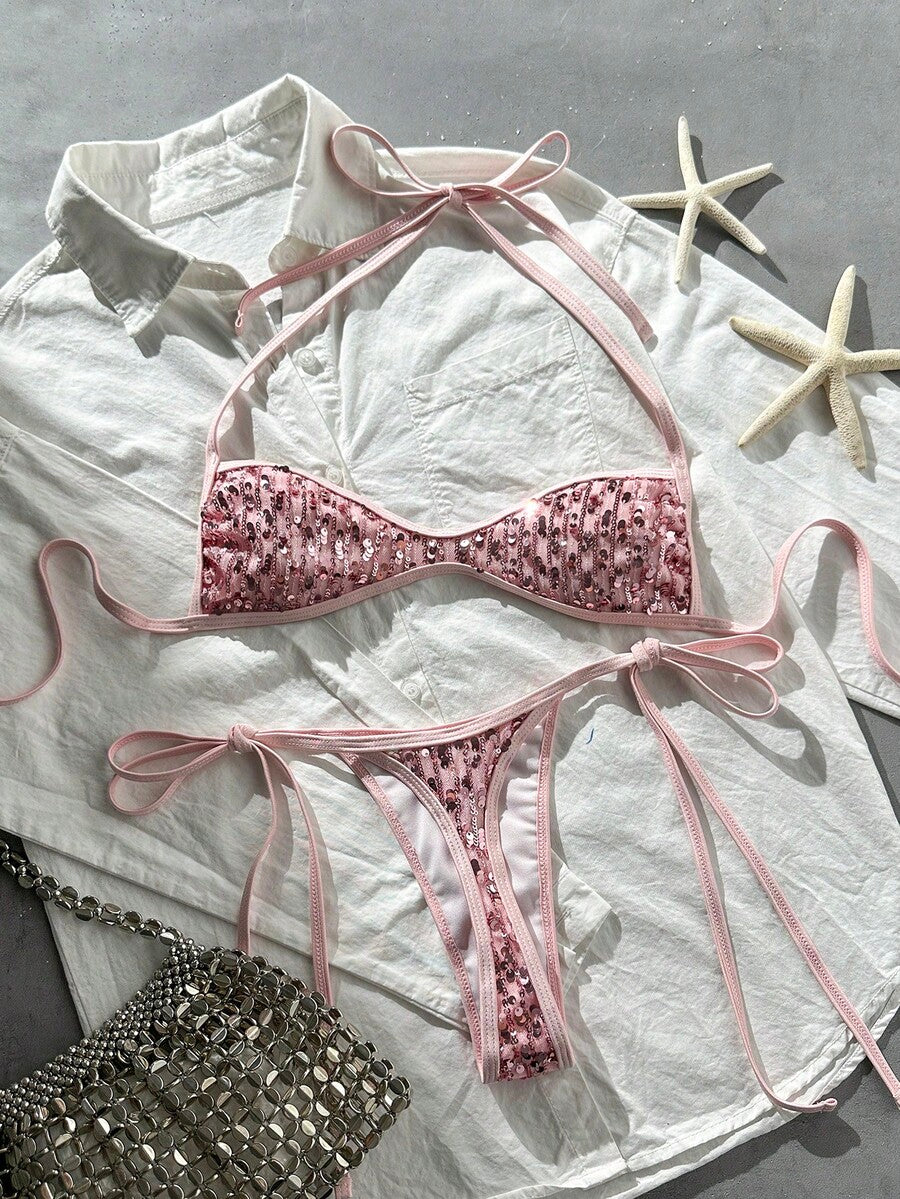 Apricot 2-piece sequin textured halter bikini set featuring a wireless top with lace-up backless ties and matching low-waist side-tie thong bottoms.