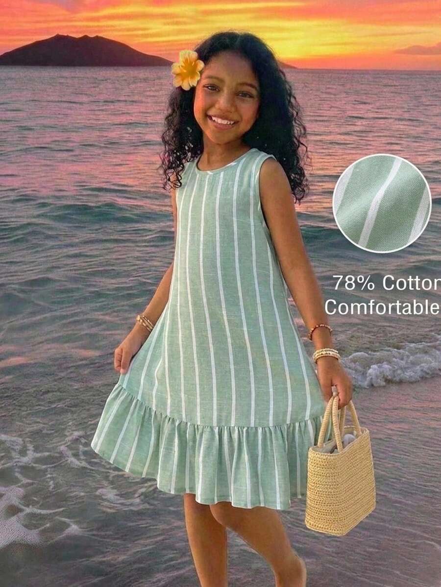 Tween girls blue denim effect sleeveless dress with round neck, button front details, and flounce hem.