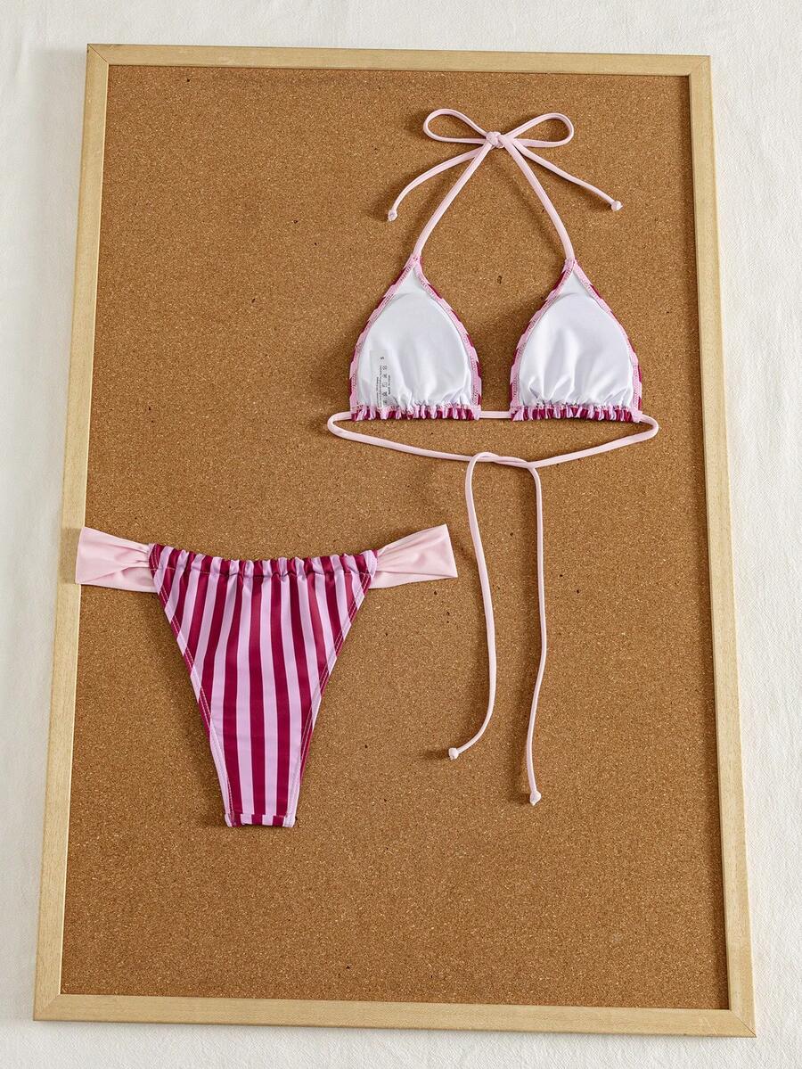 Women's striped halter two-piece swimsuit featuring a lace-up triangle top with removable padding and high-cut low-waist bikini bottoms.