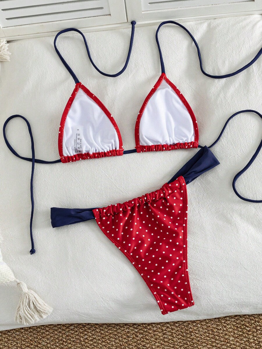 Women's striped halter two-piece swimsuit featuring a lace-up triangle top with removable padding and high-cut low-waist bikini bottoms.