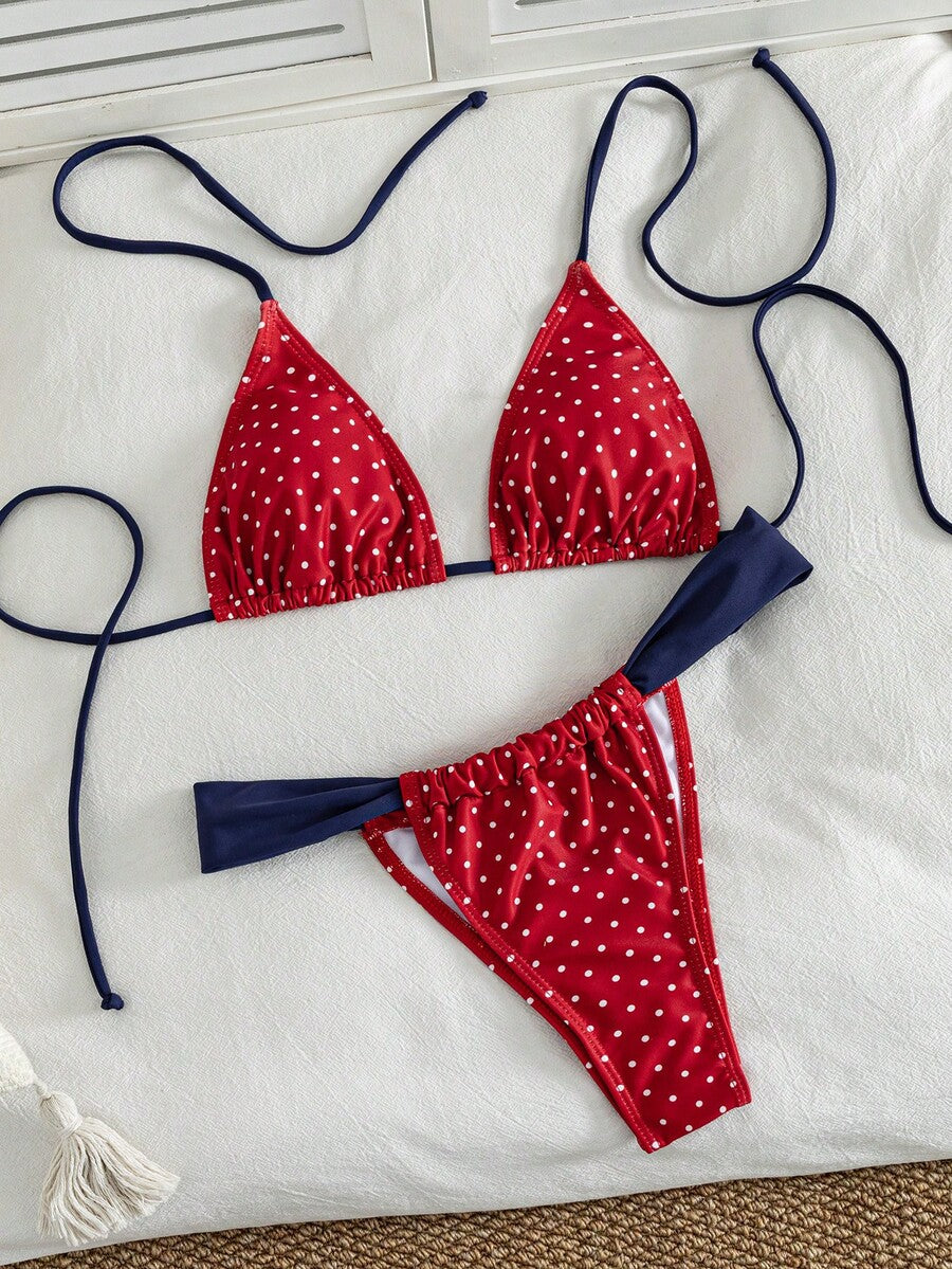 Women's striped halter two-piece swimsuit featuring a lace-up triangle top with removable padding and high-cut low-waist bikini bottoms.