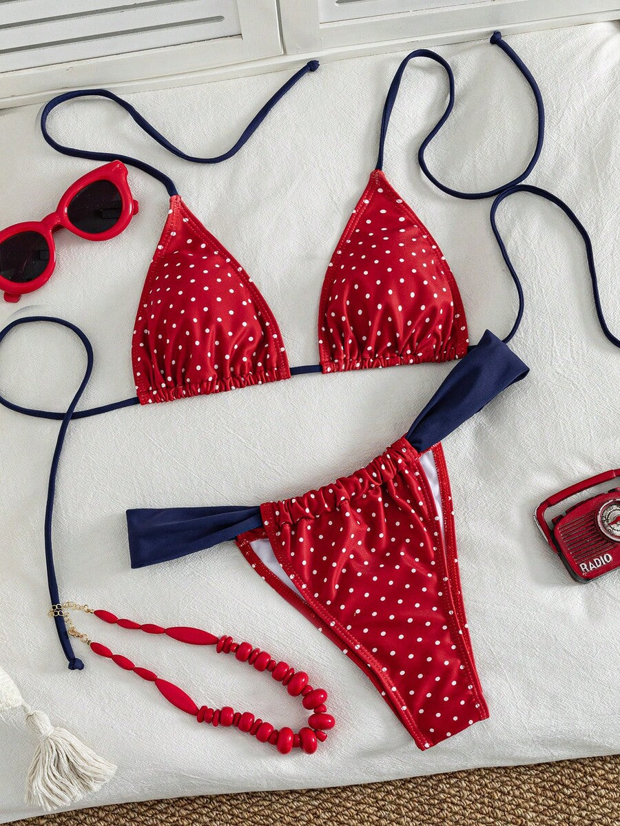Women's striped halter two-piece swimsuit featuring a lace-up triangle top with removable padding and high-cut low-waist bikini bottoms.